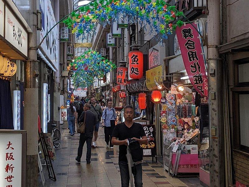 Lanterns and shop signs along the Sennichimae arcade