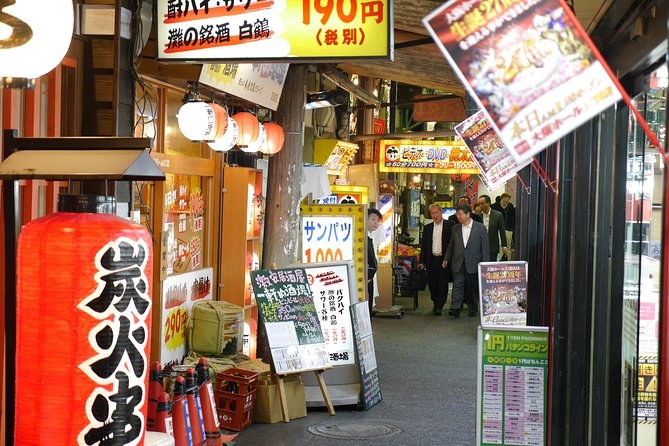 A red lantern hanging outside a kushikatsu shop in Shinsekai